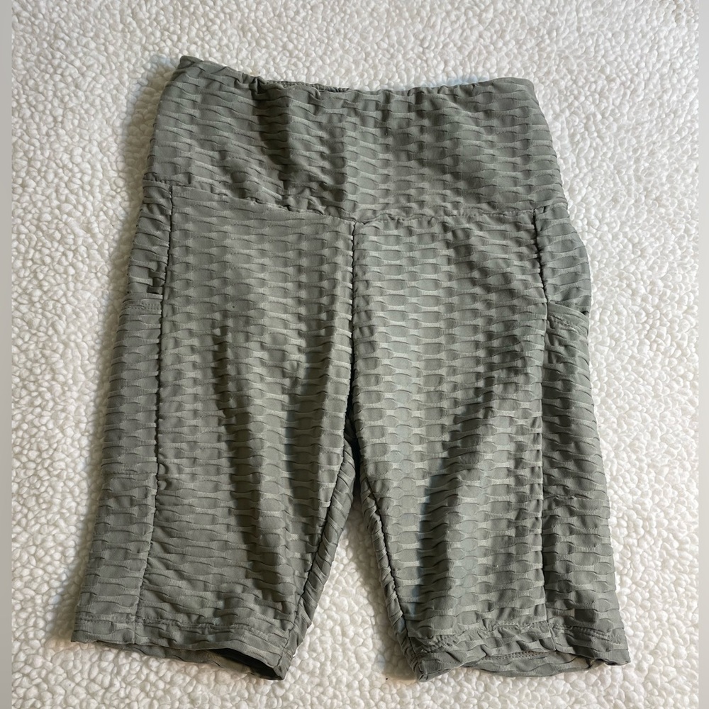Green bicycle shorts